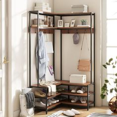 a coat rack in the corner of a room with shoes and bags hanging on it