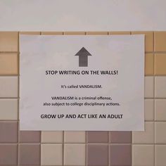 a sign on the wall stating to stop writing on the walls it's called vandalism