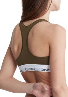 The essence of modern comfort and style, this bralette offers a sporty look you will love, thanks to its racerback design. The straps feature breathable cotton with Calvin Klein logo details for a touch of designer appeal. | Calvin Klein Women's Modern Cotton Bralette - F3785, X-Large Modern Fitted Calvin Klein Top, Supportive Calvin Klein Activewear For Workout, Calvin Klein Sporty Activewear With Medium Support, Calvin Klein Stretch Activewear For Yoga, Calvin Klein Athleisure Activewear For Yoga, Calvin Klein Medium Support Sports Bra For Workout, Cotton Workout Bra, Calvin Klein Stretch Seamless Sports Bra, Calvin Klein Fitted Sports Bra For Athleisure