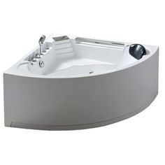 an oval shaped bathtub with two faucets on the side and one in the middle