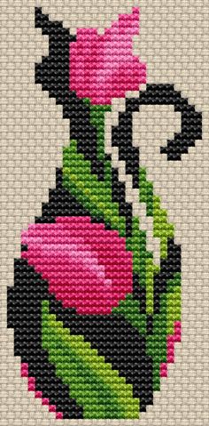 a cross stitch pattern with pink flowers in a vase