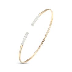 This chic bangle bracelet features pavé-set diamonds on each end for an everyday luxe look. 10K yellow gold and white rhodium 1/3 carat of round-cut diamonds The open cuff design fits most wrists Diamond Cuff Bracelet, Cuff Design, Open Bangle, Cuff Bangle Bracelet, Diamond Bangle, 3 Carat, Cuff Bangles, Round Cut Diamond, Gold Bangles