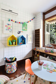 a child's playroom with toys and decor