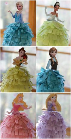 the princesses are made out of paper and they look like they're in different dresses