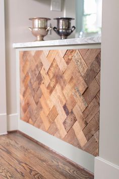 a kitchen counter made out of wooden planks