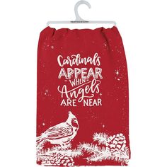 cardinals appear when angels are near printed on red drawstring bag with white writing