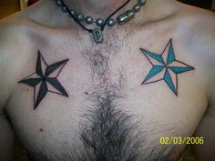 a man with three star tattoos on his chest