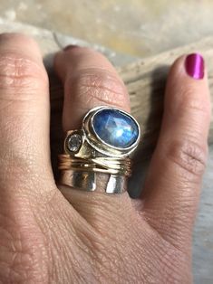 Moonbeams Ring | Etsy Fusion Style Sapphire Jewelry, Fusion Style Moonstone Jewelry For Anniversary, Fusion Style Moonstone Gemstone Ring For Anniversary, Fusion Style Anniversary Moonstone Gemstone Ring, Fusion Style Gemstone Accents Jewelry For Anniversary, Sapphire Gemstone Fusion Jewelry, Fusion Style Jewelry With Gemstone Accents For Anniversary, Fusion Oval Jewelry With Accent Stones, Fusion Style Round Gemstones With Accent Stones