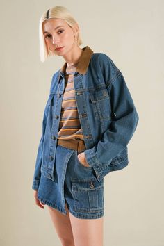 A washed denim jacket with a contrasting collar and button-down closure. Matching skort LIVIN' MY BEST LIFE DENIM SKORT Details: Self : 100% CottonContrast : 100% Cotton Size & Fit - Model is 5`8" And Wearing Size Small- Measurements Taken From Size Small- Approx. Length: 23" Casual Denim Jacket With Corduroy Collar For Streetwear, Trendy Collared Medium Wash Denim Jacket, Relaxed Fit Collared Denim Jacket, Medium Wash Utility Denim Jacket, Utility Style Medium Wash Denim Jacket, Trendy Spring Denim Jacket With Corduroy Collar, Casual Denim Jacket With Corduroy Collar For Spring, Trendy Denim Blue Jacket With Patch Pockets, Medium Wash Relaxed Fit Utility Denim Jacket