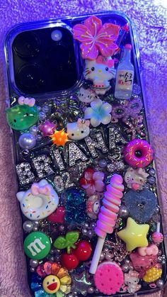 an iphone case with many different items on it