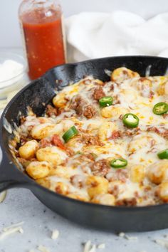 a skillet filled with some tasty looking food