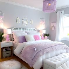 a bedroom decorated in lavender and white with lots of pillows on the bed, along with two nightstands