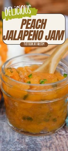 a glass jar filled with peach jalapeno jam on top of a table