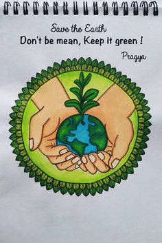 two hands holding the earth on top of a spiral notebook with words save the earth don't mean, keep it green praga