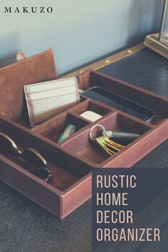 an open suitcase sitting on top of a wooden table next to a mirror and other items