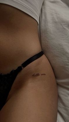 a close up of a person's stomach with the word love written on it