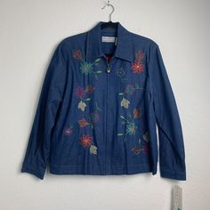 Alfred Dunner Floral Embroidered Jacket Stretch Size 14p See Pics On The Actual Retail Tag 16p See Pics Length Approx 24” Pit To Pit Approx 22” Shell 97% Cotton 3% Spandex Lining 65% Polyester 35% Cotton Fall Collared Outerwear With Floral Embroidery, Blue Embroidered Cotton Outerwear, Casual Long Sleeve Outerwear With Machine Embroidery, Spring Embroidered Collared Outerwear, Blue Long Sleeve Outerwear With Floral Embroidery, Blue Cotton Outerwear With Floral Embroidery, Blue Embroidered Outerwear For Spring, Cozy Jacket, Textured Jacket