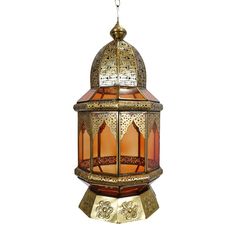 a hanging lantern with an intricate design on the top and bottom, decorated in gold