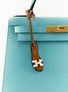 Charm in Epsom and Butler calfskin and Hunter cowhide with "Hermès Paris" hot stamp NataAccompanied by original Hermes box and ribbon Dimensions: L 7 x H 2.8 x D 0.8 cm Made in France RRP: £530 SKU: 13CHR02, 09MIAONC57 *International shipping and insurance fees are not included* Hermes Luggage, Hermes Charm, Colorful Inspiration, Hot Stamp, Leather Bag Design, Hot Bags, Mobile Art, Diy Bracelet Designs, Hermes Oran