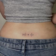 a woman's stomach with the words relax at one written on her lower back