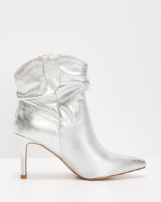 ● Heel Height: 3.25" ● Material: Vegan Leather● Stiletto heel● Ankle high booties● Side pull tabs● Pointed closed toe● No closures Vici Collection, Select Shop, Silver Fabric, Pull Tab, Relaxed Style, Stiletto Heel, Stiletto Heels, Metallic Silver, Vegan Leather