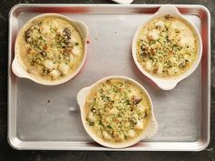 three servings of food on a tray ready to be cooked