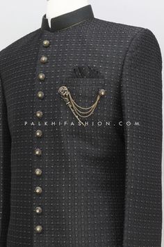 Update your ethnic wardrobe with this exquisite black silk Indo-western piece. Embellished with intricate chikankari and sequin embroidery, this garment showcases a handcrafted collar, full placket, Hook and button opening, and detachable brooch. Accompanied by contrasting gold pants. Luxury Black Sherwani With Chikankari Embroidery, Luxury Black Dress With Chikankari Embroidery, Luxury Black Unstitched Suit With Intricate Embroidery, Luxury Black Nehru Jacket With Chikankari Embroidery, Luxury Black Chikankari Embroidery Sets, Black Chikankari Embroidered Sherwani, Black Unstitched Sherwani With Dabka Embroidery, Semi-stitched Black Sherwani For Diwali, Black Embroidered Fabric With Cutdana