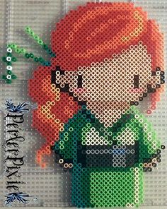 a cross stitch pattern of a girl with red hair and green shirt holding a flower