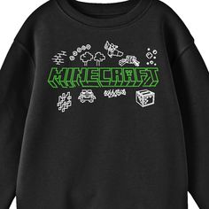 Ignite your passion for Minecraft with this youth black crew neck long sleeve sweatshirt. Featuring a playful doodle design of elements from the game behind vibrant green letters, this sweatshirt captures the essence of the Minecraft world. Made with sustainably and fairly grown USA cotton and polyester, it offers a comfortable and eco-friendly fabric that you can feel good about wearing. With its custom design, long sleeve style, and official Minecraft licensing, this sweatshirt is perfect for Black Cotton Sweatshirt With Character Print, Gaming Event Crew Neck T-shirt With Letter Print, Minecraft T Shirt Design, Black Crew Neck Sweatshirt With Character Print, Gamer Logo Print Crew Neck Top, Minecraft Hoodie, Minecraft Tshirt, Doodle Designs, Eco Friendly Fabric