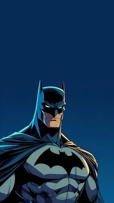 the batman is standing in front of a blue sky