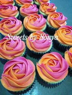 cupcakes decorated with pink and orange frosting