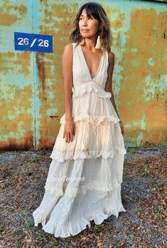 Handmade ruffled raw cotton dress with lining. Was $139 now on sale $105 Decorate with lace. Deep v neck, elastic at the back. 2 colors cream and white, Measurements: Bust 32 up to 38 inches. Hip Free Length 56.5 inches. CARE: Machine wash cold. Summer Floor-length Gown With Ruffles, Sleeveless Ruffled Dress For Beach Wedding, Floor-length Ruffled Maxi Dress For Wedding, Spring Gown With Ruffles, Long Dress, Spring Gown With Ruffles, Long Dress Shape, Summer Maxi Length Gown With Ruffles, Chic Maxi Length Dress For Beach Wedding, Summer Maxi Gown With Ruffles, Long Gown With Ruffles For Spring