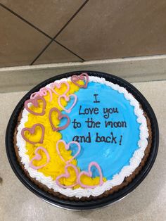 a birthday cake with the words i love you to the moon and back