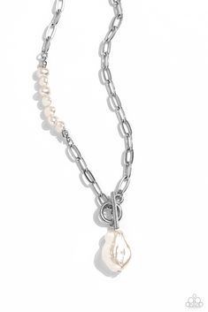 Featuring an elegant lariat closure, an oversized, baroque white pearl cascades from the bottom of a silver paperclip chain for a refined fashion. Dainty, glossy baroque pearl beads are infused along one side of the silver chain for an additional touch of abstract sheen to the charming design.

 Sold as one individual necklace. Includes one pair of matching earrings. Refined Fashion, Latest Jewellery Trends, Paparazzi Accessories, White Necklace, Latest Jewellery, Paparazzi Jewelry, Baroque Pearls, White Pearl, Cosmopolitan