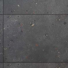 an aerial view of the ground with rocks and gravel on it, looking down at something in the distance