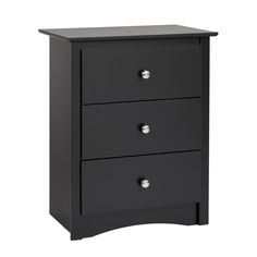 a black night stand with three drawers and two knobs on the bottom, in front of a white background