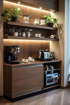 a coffee bar with pots and cups on it