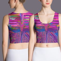 "Step into a world of mesmerizing style with our Sleeveless Dancewear Vaporwave Art Crop Top. Designed to make you look absolutely fabulous, this body-hugging crop top is a must-have for fashion-forward individuals. Featuring the captivating Vaporwave art called Outrun Sun, this crop top bursts with vibrant pops of pink and purple, exuding an electrifying energy. With street art-inspired elements, it's the perfect blend of edgy and chic. Crafted from a high-quality blend of 82% polyester and 18% spandex, this crop top offers a comfortable and luxurious feel. Weighing 6.78 oz/yd² (230 g/m this fabric boasts a perfect balance of durability and stretchability. It smoothly contours to your body, enhancing your natural curves and ensuring a flattering fit. The four-way stretch material allows t Festival Clothes, Trippy Designs, Festival Crop Tops, Rave Music, Vaporwave Art, Absolutely Fabulous, Cropped Tube Top, Natural Curves, Top Crop