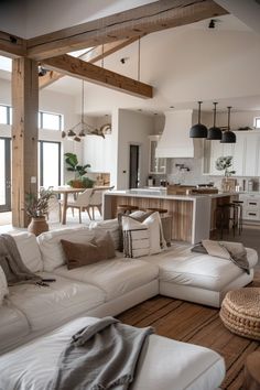 Spacious modern farmhouse living room featuring plush white sofas, exposed wooden beams, and tasteful neutral decor. Modern Farmhouse Family Room Ideas, Clean Farmhouse Style, Small Open Plan Kitchens, Bethel Church, Minimalist Farmhouse, Farmhouse Dining Rooms Decor, Farmhouse Living Room Decor Ideas, Dream Interior