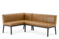 a brown leather couch with black legs and backrests on an isolated white background