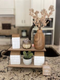 Wooden stand, candle, plants, house figurines Kitchen Island Decor, Island Decor, V60 Coffee, Kitchen Countertops, Kitchen Island, Countertops