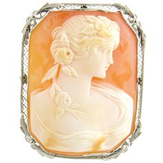 Vintage 14 Karat White Gold Cameo Brooch / Pendant This elegant cameo features a lovely lady in profile set in delicate white gold filigree. Can be worn as a brooch or a pendant. Size: 45 mm x 35 mm Weight: 9.4 dwt. / 14.7 gr. Acid tested for 14K gold. Very good condition, professionally polished. Will come packaged in a gift box. Classic Cameo Brooches For Wedding, Elegant Formal Brooch With Intaglio Detail, Elegant Cameo Brooch For Formal Wear, Elegant Intaglio Brooch For Formal Occasions, Elegant Evening Jewelry With Cameo Detail, Elegant Intaglio Brooches For Gifts, Elegant Formal Cameo Brooch, Luxury Cameo Brooch For Wedding, White Cameo Brooch For Formal Occasions