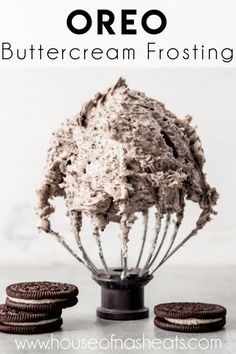 oreo buttercream frosting in a mixer with cookies on the side