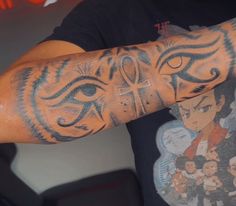 a man with a tiger tattoo on his arm