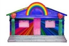 an inflatable house with rainbows on the roof and windows, is shown