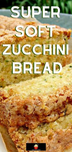 a close up of bread on a plate with the words super soft zucchini bread