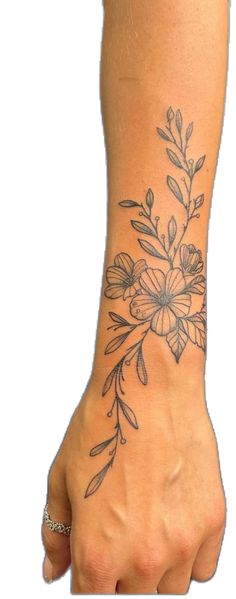 a woman's hand with a flower tattoo on the left side of her arm