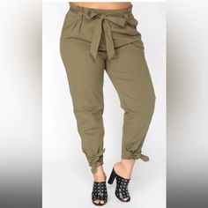 Fashion Nova Olive Cargo Pants Size Medium Pants Are New With Tag And Can Be Dressed Up Or Down To Fit Your Style. High Rise Woven Fabric No Stretch Oversized Fit Cinch Waist Pull Tie Waist And Ankle Tie Skinny Leg Approximate Measurements Laying Flat: Waist: 15" Hip: 23 3/4" Length: 38" Rise: 11" Tags: Cargo, Camo Pants, 100% Cotton, Comfortable, Casual, Dress Up, Soft, Wearable, Flattering Chic Khaki Paperbag Waist Bottoms, Trendy Paperbag Waist Pants With Elastic Waistband, Khaki Paperbag Waist Bottoms For Day Out, Green Paperbag Waist Bottoms For Work, Green Paperbag Waist Pants For Spring, Casual Khaki Paperbag Waist Bottoms, High-waisted Khaki Pants For Day Out, Trendy Paperbag Waist Pants For Spring, Trendy Spring Pants With Paperbag Waist