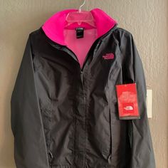 * New With Tags * Size: Xs * 18" Pit To Pit * 24" Long *19" Width At Bottom * The Color Is Graphite With Hot Pink Trim. * The Hood Can Be Rolled Up And Tucked Under The Color. You Can Seal It With A Small Velcro Strip. Pink Fall Outerwear For Outdoor Activities, Pink Outerwear For Outdoor Activities In Fall, Pink Outerwear For Fall Outdoor Activities, Pink Waterproof Winter Outerwear, The North Face Pink Spring Outerwear, Pink The North Face Outerwear For Spring, Sporty Waterproof Pink Outerwear, Pink Waterproof Sporty Outerwear, Sporty Pink Waterproof Outerwear