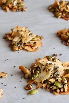 some kind of food that is sitting on a table with other things around it, including nuts and seeds